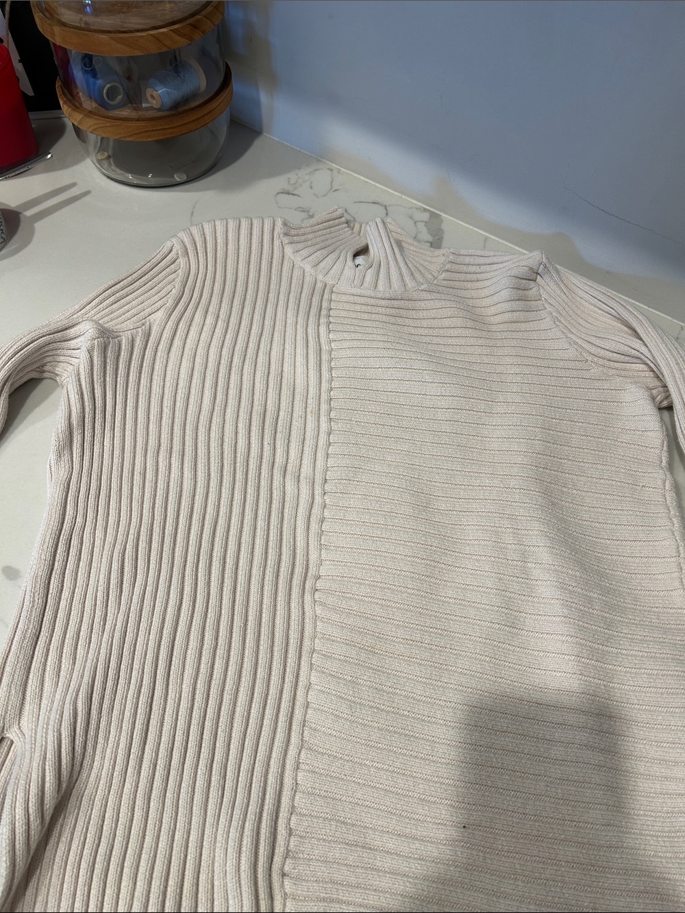 CAbi Two‑Texture Cream Ribbed Mock Neck Sweater